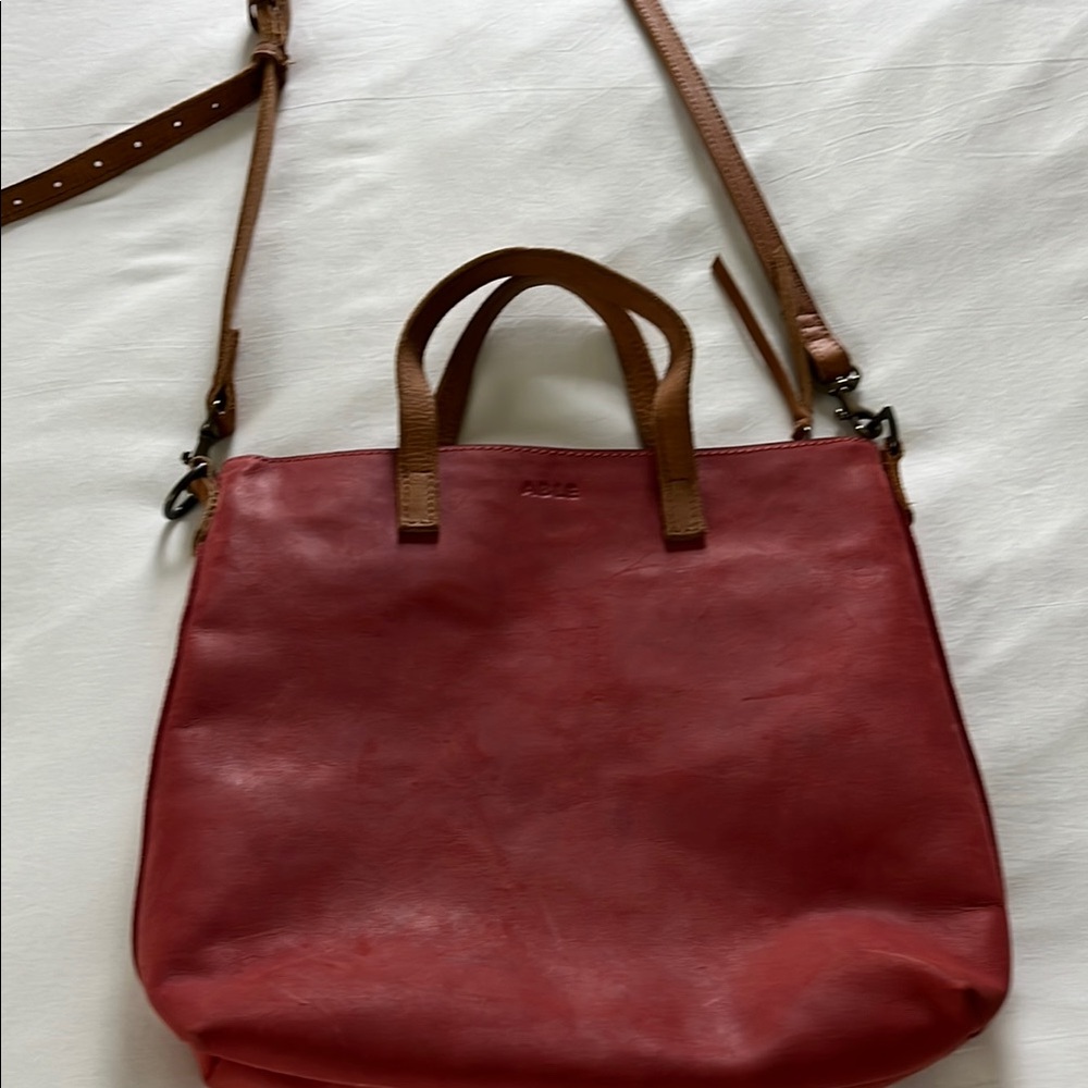 Able Red and Brown Leather Tote Bag with Elegant Design